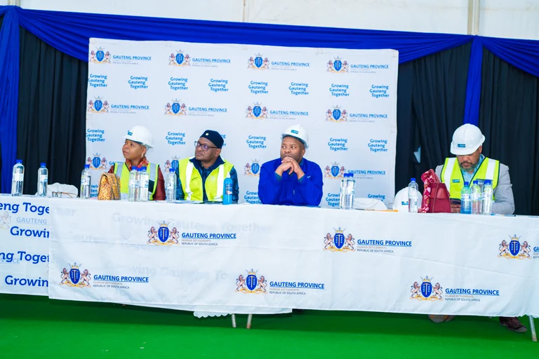 Officials at the media table during the Greenhills title deed handover